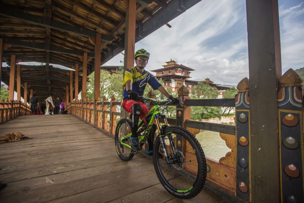 Crossing the cantilever bridge at Punakha Dzong